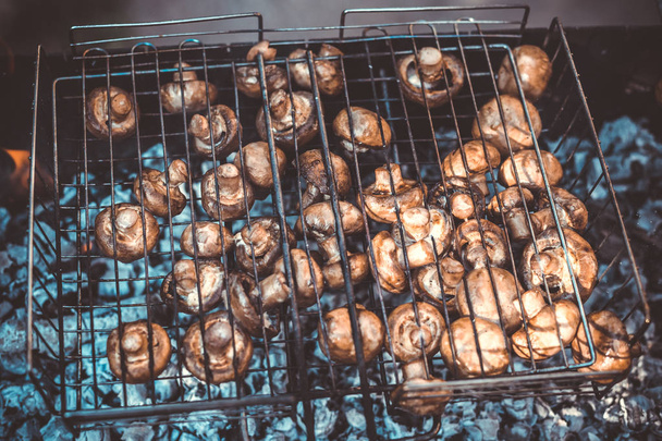 Fried mushrooms on the grill. - Fotó, kép