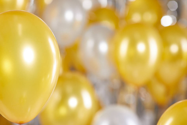 Golden and silver balloons background. New Year concept  - Фото, изображение