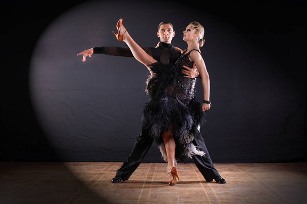 dancers in ballroom isolated on black background - Foto, imagen