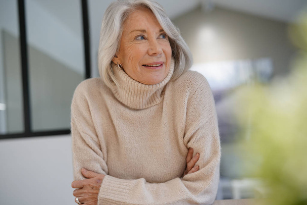  Senior woman looking happy at home                              - Foto, Imagem
