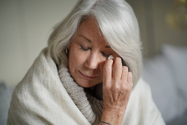   Senior woman at home feeling unwell                            - Fotografie, Obrázek