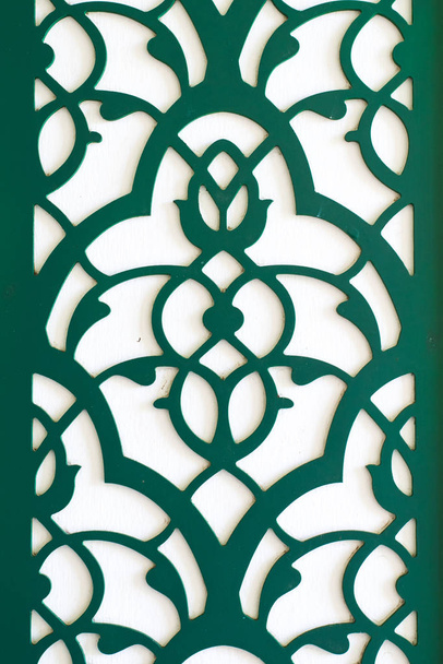 Abstrakcyjny wzór w stylu arabskim. Współczesny wzór zielony i brązowy - Zdjęcie, obraz