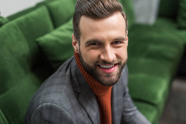 portrait of smiling man in formal wear looking at camera - Fotografie, Obrázek