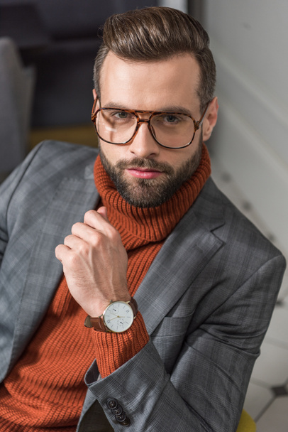 portrait of bearded man in formal wear and glasses looking at camera - Fotó, kép
