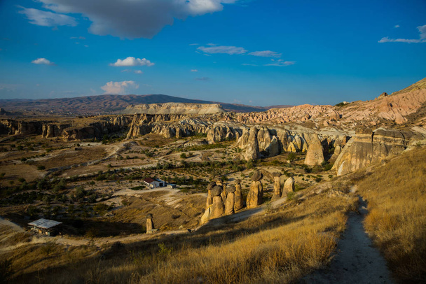 Fairy Chimney. Multihead stone mushrooms in the Valley of the Monks. Pasabag Valley, Anatolia. Cappadocia, Turkey. - Φωτογραφία, εικόνα