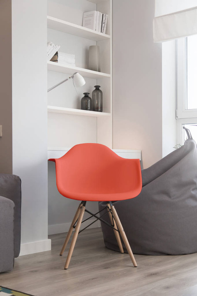 Interior of the room, chair Color of the year 2019 Living Coral. - Foto, afbeelding