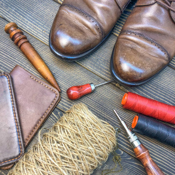 leather goods. workshop for the manufacture of clothing and accessories. - 写真・画像