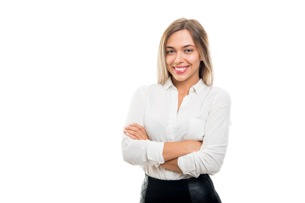 Portrait of beautiful business woman standing with arms crossed isolated on white background with copy space advertising area - Photo, Image