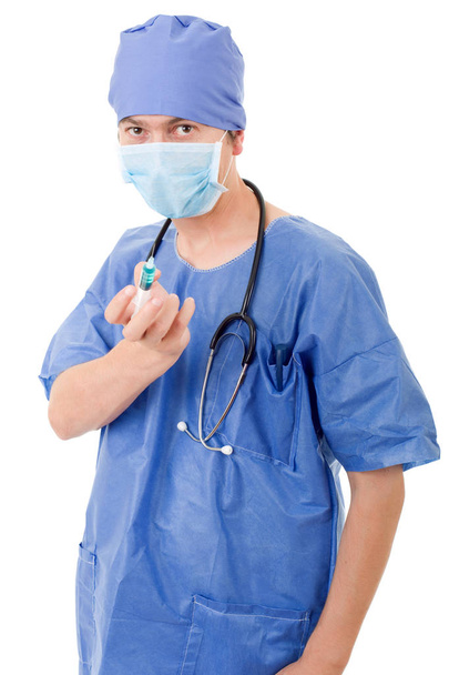 doctor tonto con una jeringa aislada sobre fondo blanco
 - Foto, imagen