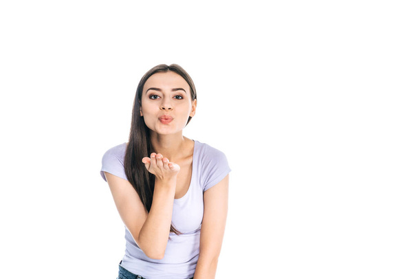 portrait of young beautiful woman blowing kiss isolated on white - Φωτογραφία, εικόνα