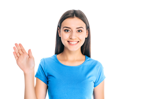 portrait of attractive positive woman waving to camera isolated on white - Photo, Image