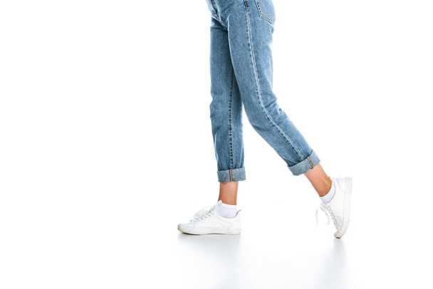partial view of stylish woman in jeans isolated on white - Photo, Image
