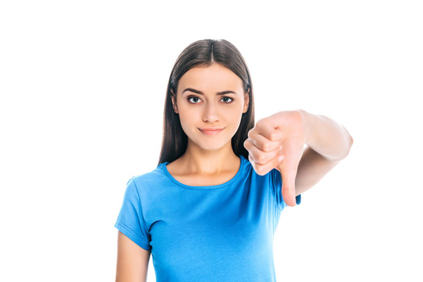 portrait of attractive woman showing thumb down isolated on white - Φωτογραφία, εικόνα
