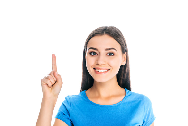 portrait of attractive smiling woman pointing away isolated on white - Φωτογραφία, εικόνα