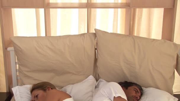 Bored couple sleeping together - Materiał filmowy, wideo