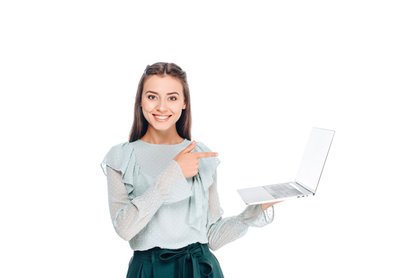 portrait of young smiling woman with laptop isolated on white - Foto, Imagen