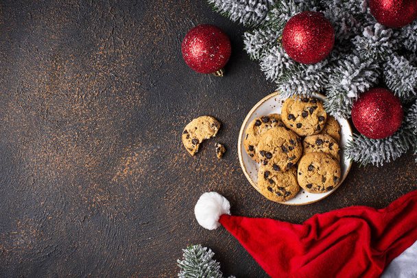 Cookies for Santa near the Christmas tree. Top view, flat lay - Photo, image