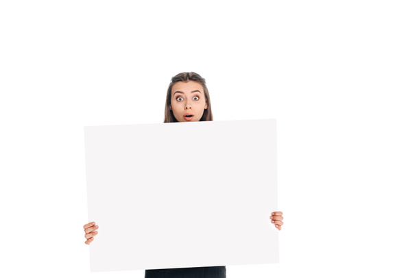 portrait of emotional young woman holding blank banner isolated on white - Photo, Image