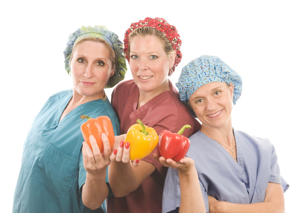 Grupo de enfermeiros com frutas e hortaliças saudáveis
 - Foto, Imagem