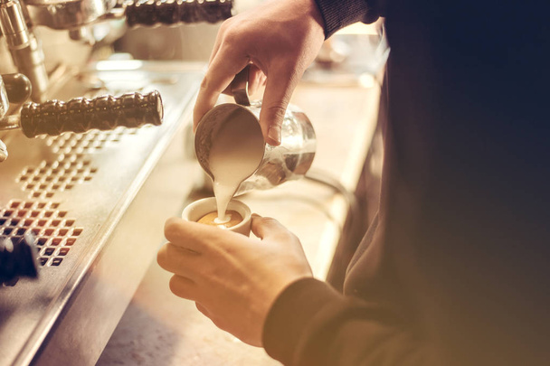 Barista making a espresso with a classic Italian coffee machine with steam in background - Φωτογραφία, εικόνα