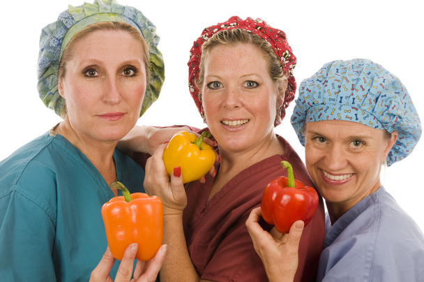 медсёстры продвигают здоровую диету со свежим цветным перцем
 - Фото, изображение