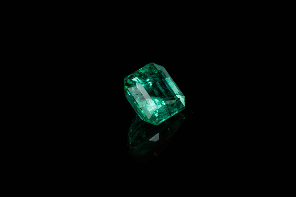 Macro mineral Emerald gemstone faceted on black background close up - Photo, Image