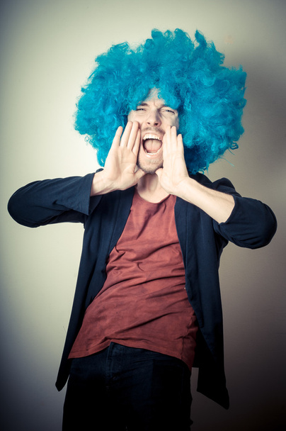 vintage portrait of fashion guy with curly blue wig - Photo, Image