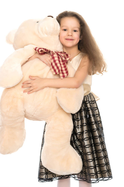 Little girl with teddy bear - Fotografie, Obrázek