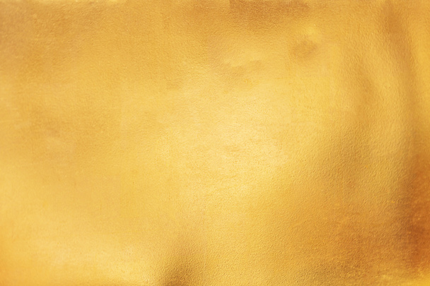 Goud abstracte achtergrond of textuur en hellingen schaduw. - Foto, afbeelding