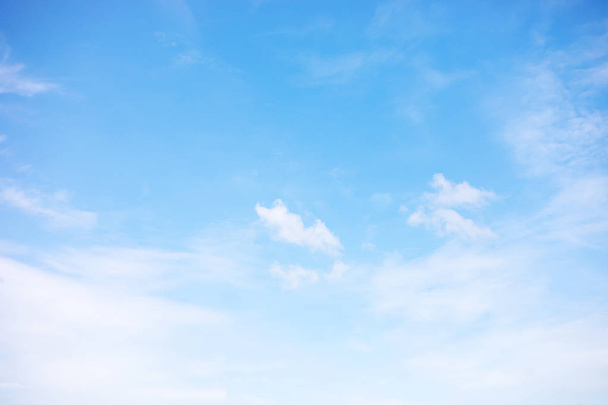 Blue sky background and white clouds soft focus, and copy space. - Photo, Image