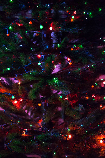 Blurred abstract background with bokeh festive Christmas lights - Φωτογραφία, εικόνα