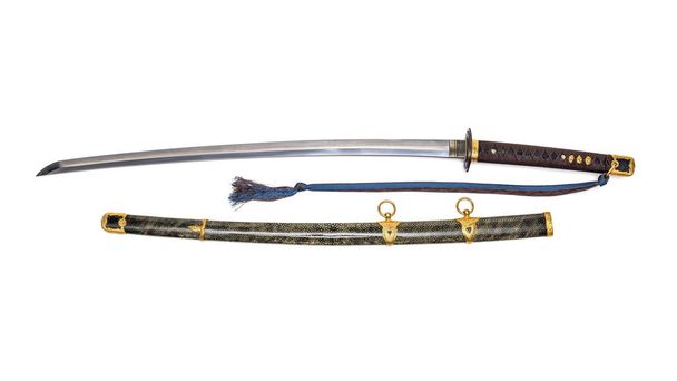 'Kai Gunto': Japanilainen merijalkaväen miekka toisesta maailmansodasta, jossa rupi kääritään valkoiseen taustaan eristetyllä rauskun iholla
. - Valokuva, kuva