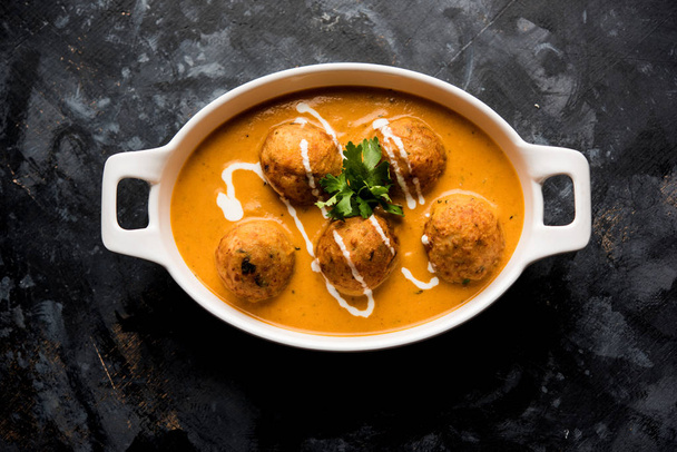 Malai Kofta Curry is a Mughlai special recipe served in a bowl. Selective focus - Photo, Image