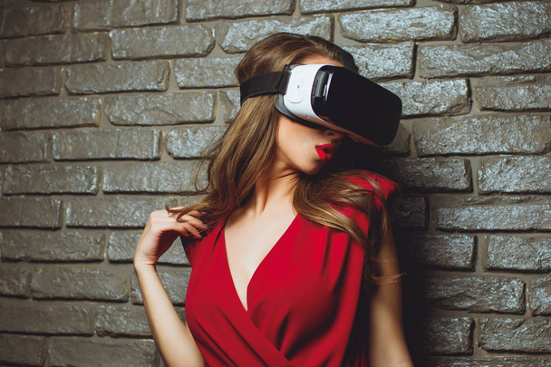 girl in red dress virtual glasses vr. - Foto, Bild