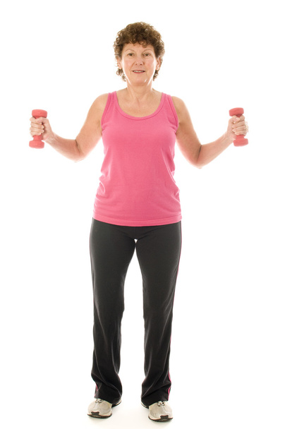 sênior mulher de meia-idade se exercitando com halteres
 - Foto, Imagem