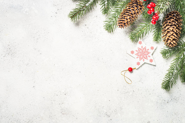 Christmas background with fir tree and decorations on white  bac - Foto, Imagem