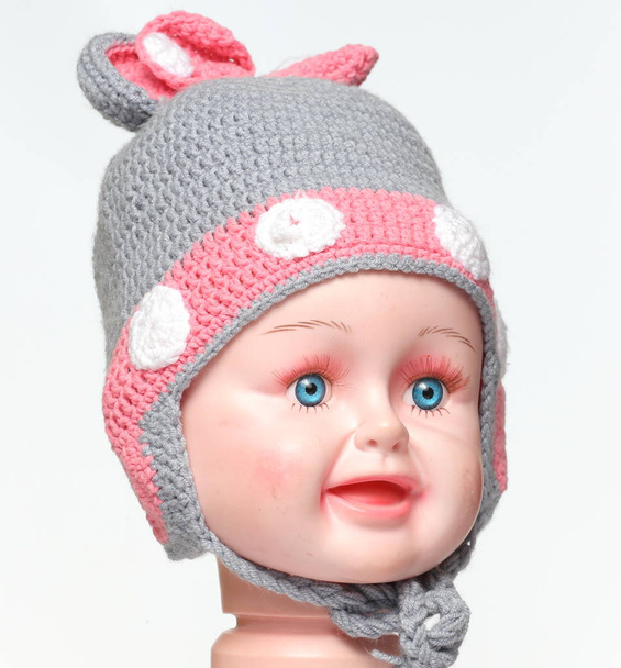 colored knitted children's winter hat made of wool - Photo, Image