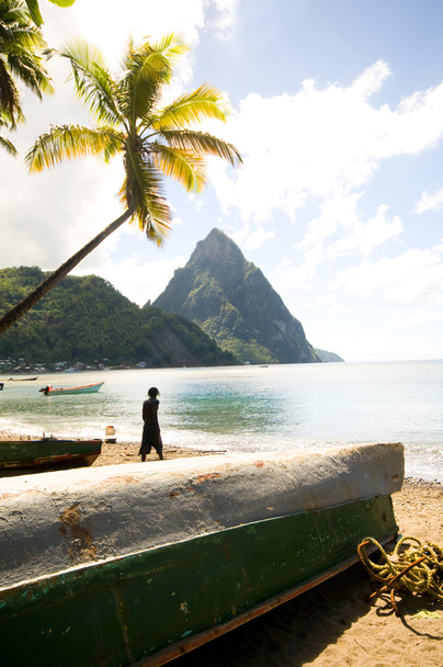 soufriere st. lucia twin piton mountain peaks with fishing boat - 写真・画像