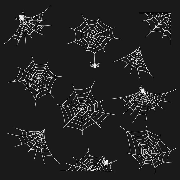набор различных видов паутины белого цвета с пауками белого цвета на темном фоне
 - Вектор,изображение