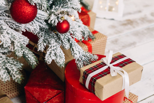 beautiful Christmas decorations and gifts under the Christmas tree - Φωτογραφία, εικόνα