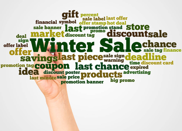 Winter Sale word cloud and hand with marker concept on white background. - Photo, Image