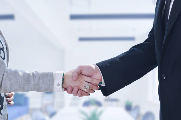 close up of businessman and businesswoman handshake - Foto, Bild