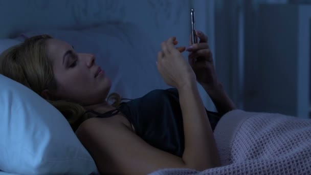 Wife refuses intimacy with husband, typing message to lover, crisis in relations - Materiał filmowy, wideo