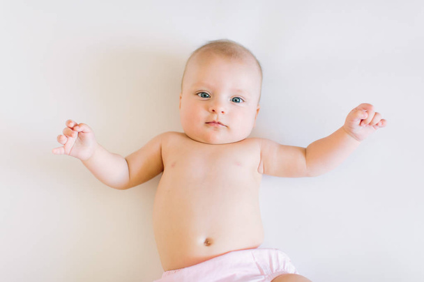 Cute baby on a white background - Foto, afbeelding