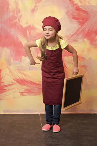 Chef child in apron on colorful background. - Фото, зображення