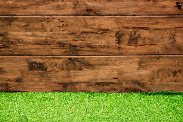 Grass floor with wooden wall - Фото, изображение