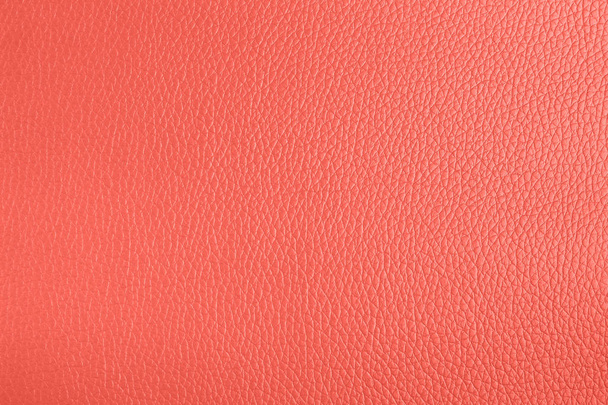 Кожаный текстурированный фон живого кораллового цвета
. - Фото, изображение