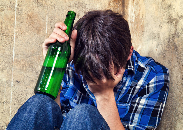Sad Teenager in Alcohol Addiction with a Beer - Фото, зображення