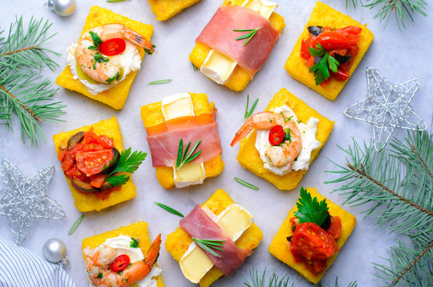Polenta Bites with Different Toppings, Variety of Polenta Appetizers, Delicious Snack, Top View - Photo, Image