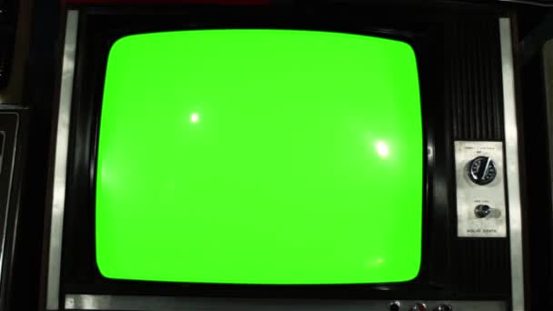 80s TV Green Screen with Many 80s Tvs. Dolly Out. Blue Tone. Ready to Replace Green Screen With any Footage or Picture you Want. You Can Do it With Keying (Chroma Key) Effect in After Effect. - Footage, Video